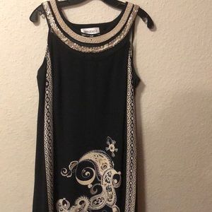 A line dress with embellishments. Super chic